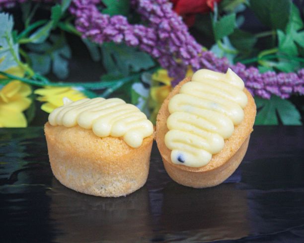 Blueberry friand topped with passionfruit buttercream (gf)(df)(v)