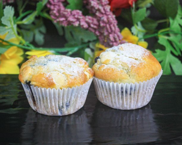 Blueberry white chocolate muffins with butter on the side (v)