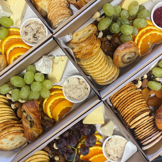 Individual Brunch Box: Fresh fruit, mini-Danish pastry, mini-croissant, local & international cheeses, house-made dips, crackers, dried fruit & nuts.